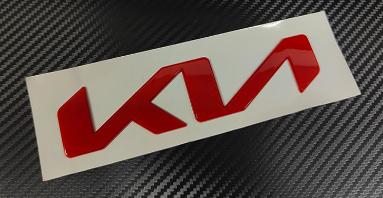 Logo "KN" nắp capo xe Kia Sportage 2022