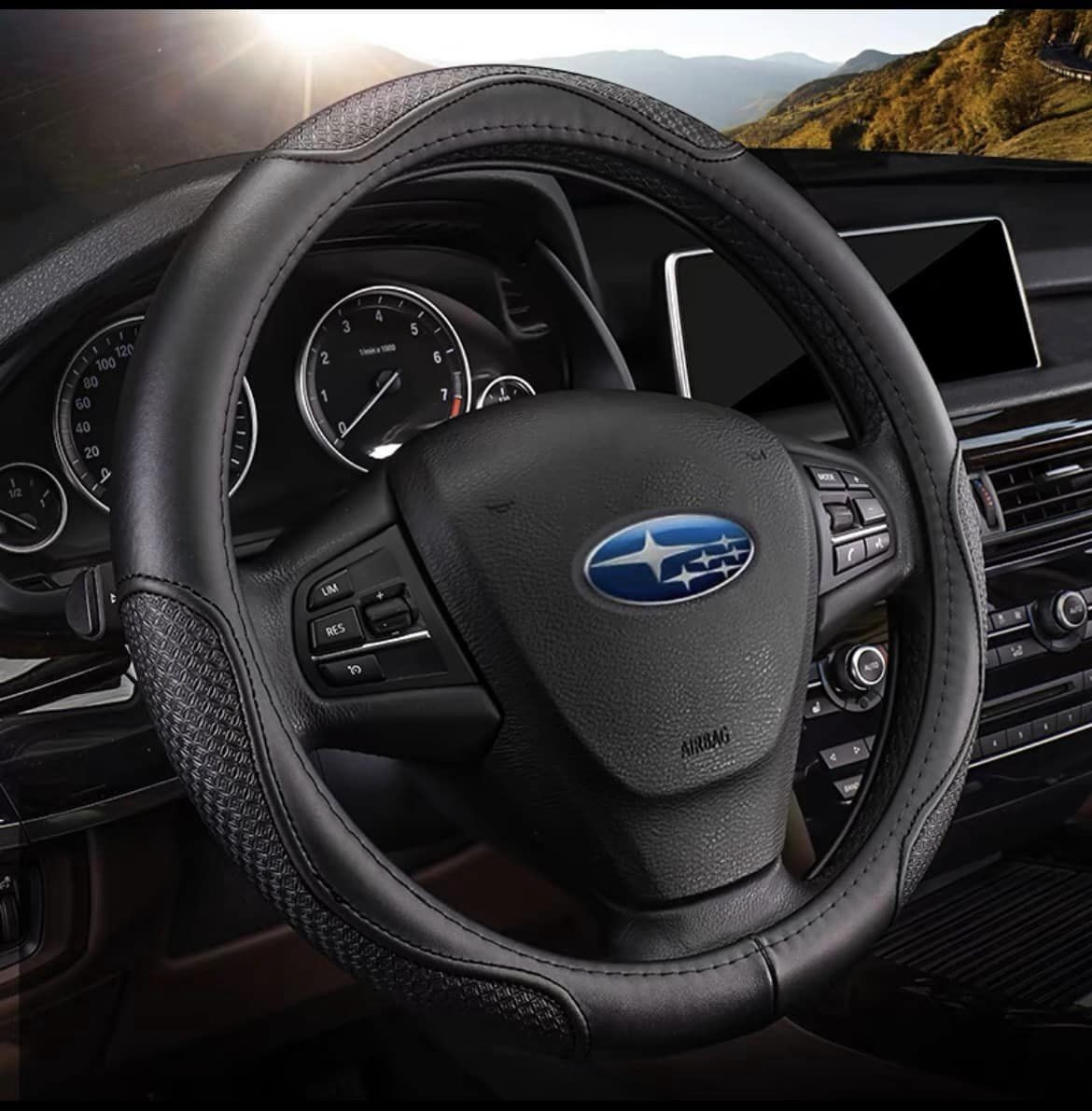 Bọc da vô lăng cacbon subaru forester